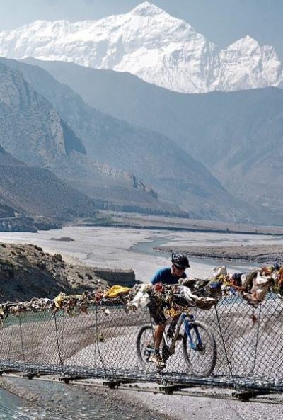 Doug Pulleyblank Cycling on the  tour with redspokes